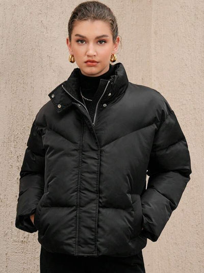 Schwarze winddichte Pufferjacke mit hohem Halsausschnitt