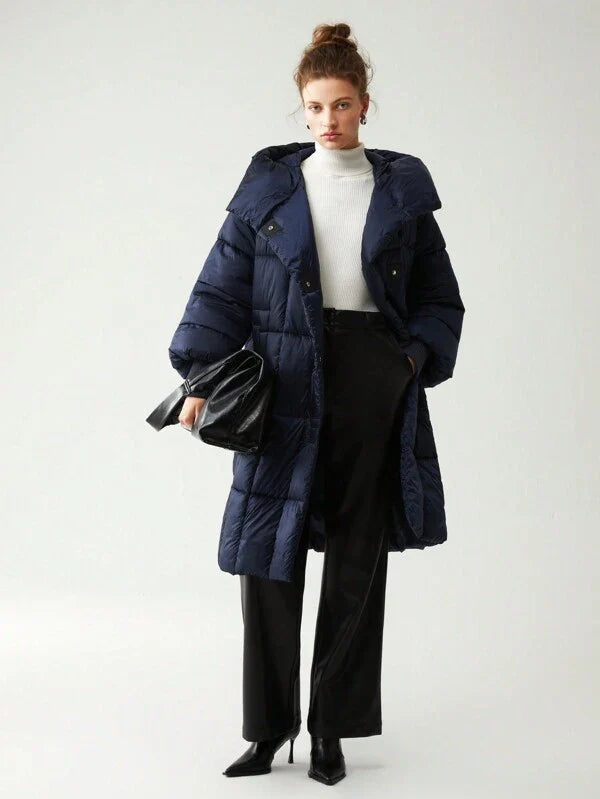 Lange Steppjacke mit Kapuze